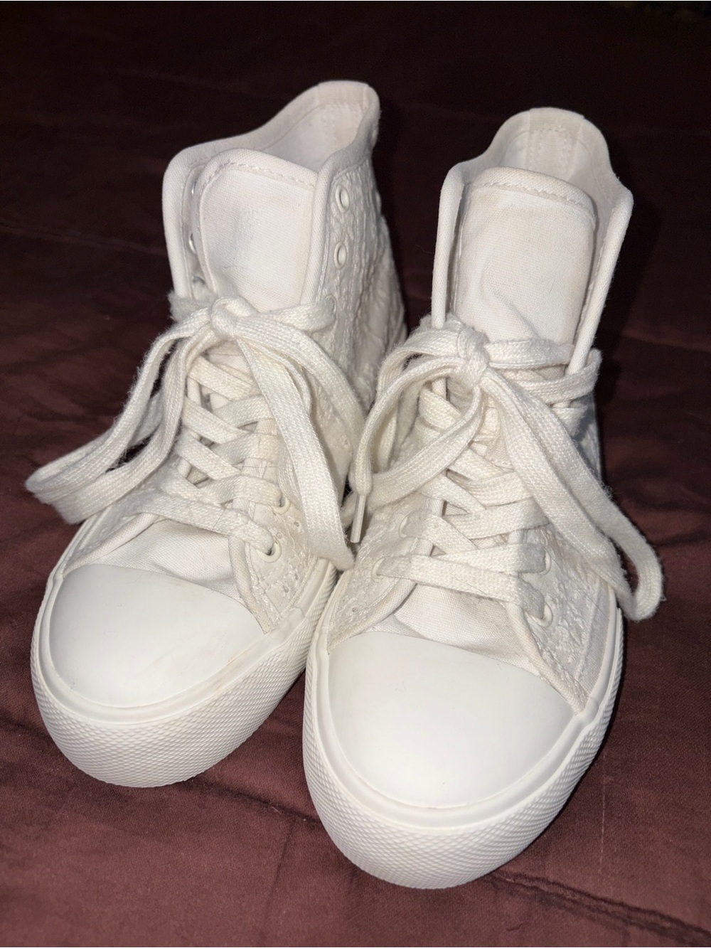 White Canvas Hi-Top Sneakers by American Eagle.